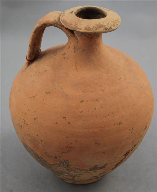 A Roman terracotta flagon, c.2nd century AD, 19cm